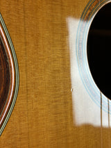 Close-up of a guitar's soundhole and body