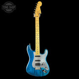 Blue electric guitar with a black background