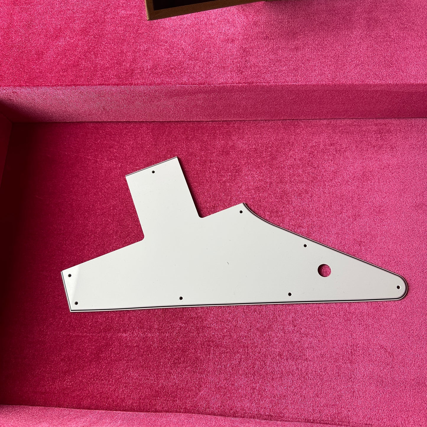 White pickguard for Used 2022 Gibson Custom Shop 1958 Explorer Reissue Korina Black Pickguard.