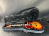 Guitar in a case on a gray background