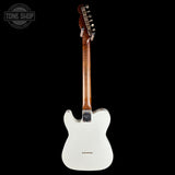 A white electric guitar shown from the back against a solid black background, with a visible Tone Shop watermark in the top-left corner.