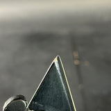 Close-up of a metallic object with a blurred background