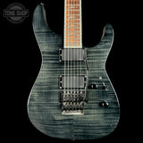 Electric guitar with a black and gray pattern on a black background, featuring the Tone Shop logo.
