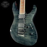 Electric guitar with a blue flame finish on a black background, featuring the Tone Shop logo.