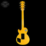 Yellow electric guitar on a black background with 'Tone Shop' logo.