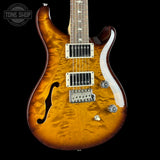 Front angle of PRS Paul Reed Smith CE24 Semi-Hollow Quilt Black Amber.
