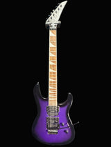 Purple electric guitar against a gray background