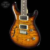 Front angle of 2024 PRS Paul Reed Smith CE24 Semi-Hollow Quilt Black Amber.