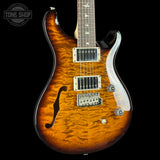 Front angle of 2024 PRS Paul Reed Smith CE24 Semi-Hollow Quilt Black Amber.