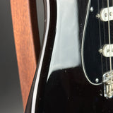 Wear on body of Used 2000 Fender American Vintage '57 Strat Blk.