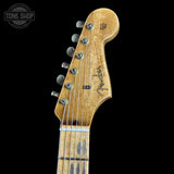 Fender guitar headstock with brand logo on a black background