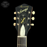 Harmony Sovereign guitar headstock with brand logo on a black background