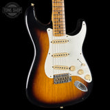 Electric guitar with a sunburst finish on a black background, featuring the Tone Shop logo.