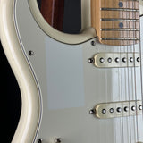 Discoloration on pickguard of Used 2018 Fender American Standard Stratocaster Vintage White Left Handed.