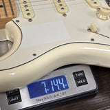 Used 2018 Fender American Standard Stratocaster Vintage White Left Handed on scale displaying weight.