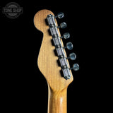 Guitar headstock with tuning pegs on a black background, featuring 'Tone Shop' logo.