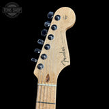 Fender Stratocaster headstock on a black background