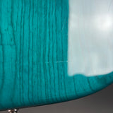 Close-up of teal fabric with a white border