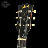 Gibson Les Paul Junior guitar headstock on a black background