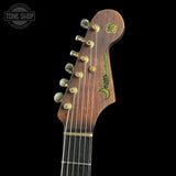 Guitar headstock with brand logo on a black background