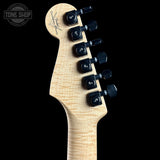 Guitar headstock with tuning pegs on a black background, featuring the Tone Shop logo.