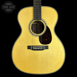 Front of Martin Custom Shop 28/45 Style OM Adirondack/Wild Grain East Indian Rosewood.