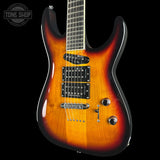 A double-cutaway electric guitar with a classic sunburst finish, featuring a bright orange and yellow center fading to black at the edges. It has black hardware, including humbucker pickups, a chrome bridge, and two control knobs, shown against a solid black background with a Tone Shop watermark in the top left corner.