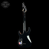 A black electric guitar shown from the back against a solid black background, with a Tone Shop watermark in the upper left corner.