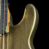 Front of right horn of Ernie Ball Music Man 50th Anniversary StingRay Molten Gold.