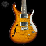 Front angle of 2024 PRS Paul Reed Smith CE24 Semi-Hollow Quilt Black Amber.