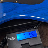 Fender Custom Shop American Custom Strat MN NOS Sapphire Blue Transparent on scale displaying weight.