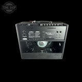 A black Marshall Mustang CGS 300 guitar amplifier cabinet shown from the front against a solid black background, with a Tone Shop watermark in the top-left corner.