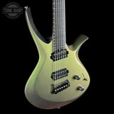 A modern electric guitar with a metallic olive green body, black neck, and black hardware, shown against a solid black background with a Tone Shop watermark in the top-left corner.