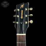 Headstock of Rock N Roll Relics Revenge Jr Gold W/Black Polka Dots Relic.