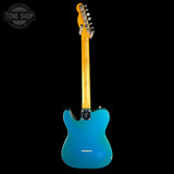 Blue electric guitar with a visible brand logo on a black background