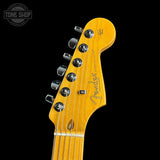 Fender guitar headstock on a black background with 'Tone Shop' logo.