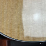 Close-up of a textured surface with a gradient from beige to white.