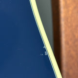 Blemish on side of Used Martin Custom Shop OM Red/White/Blue EIR/Sitka.