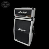 A Marshall guitar amplifier head and matching speaker cabinet stacked together, photographed on a solid black background. The cabinet has a black front grille with the white Marshall logo, and the head unit has a black front with white script branding, silver trim, and control knobs.