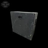 A vintage black speaker cabinet or amplifier enclosure shown from a three-quarters angle against a solid black background, with a Tone Shop watermark in the top-left corner.