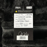 A product tag for a custom patterned shirt from Provisions by Johnnie-O, laid flat on a black furry surface. The tag shows handwritten details for a 'Custom Q4 Shorttail' with 'Pattern Thin' in black thread, including a signature and barcode.