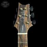 Headstock of PRS Wood Library Custom 24 Stoptail Limited Edition Charcoal Stained Neck.