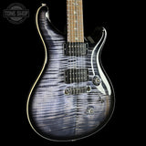 Front angle of PRS Wood Library Custom 24 Stoptail Limited Edition Purple Mist Stained Neck.