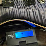 PRS Wood Library Custom 24 Stoptail Limited Edition Purple Mist Stained Neck on scale displaying weight.