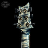 Back of headstock of PRS Wood Library Custom 24 Stoptail Limited Edition Faded Whale Blue Stained Neck.