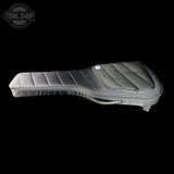 Guitar case with 'Tone Shop' logo on a black background