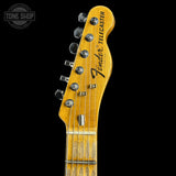 Fender Telecaster guitar headstock on a black background with 'Tone Shop' logo.