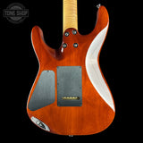 Rear view of an electric guitar body in a glossy orange-brown finish with a white side stripe, black pickups, and a light wood neck, shown against a black background with a Tone Shop watermark.