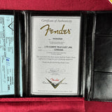 A Fender Certificate of Authenticity document displayed inside an open black leather portfolio case lined with red velvet. The certificate is dated 10/24/2024 and includes the Fender logo and signature.