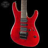 A red electric guitar with a flamed maple wood finish, featuring black hardware and pickups, shown against a solid black background with a Tone Shop watermark in the top left corner.